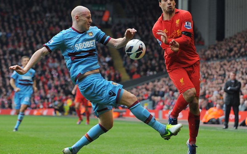Image for Former West Ham star James Collins reveals what Kop banner said before Luis Suarez embarrassed him